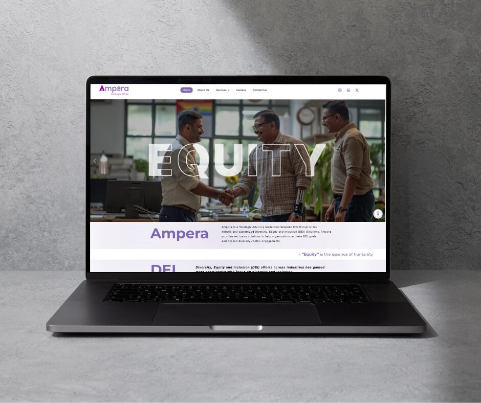 A laptop displays the Ampera homepage.